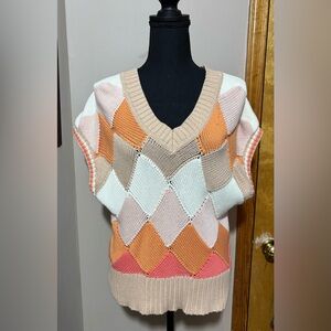 V neck sweater vest. Argyle print. Size S. Excellent condition.